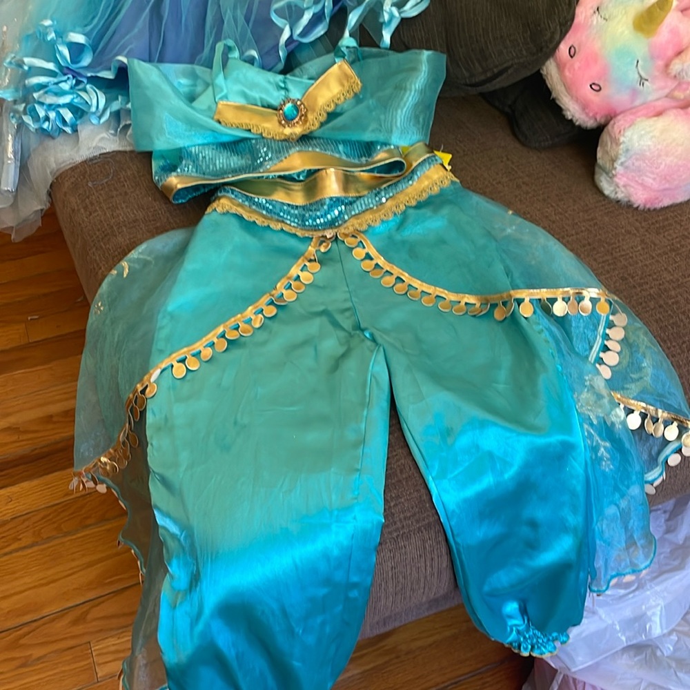 Size 130 Jazmin costume 2 piece pants and crop top blue and gold in color